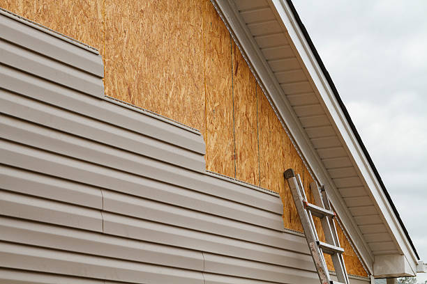 Professional Siding Contractor technician working in Siler City, NC